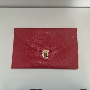 Red clutch bag